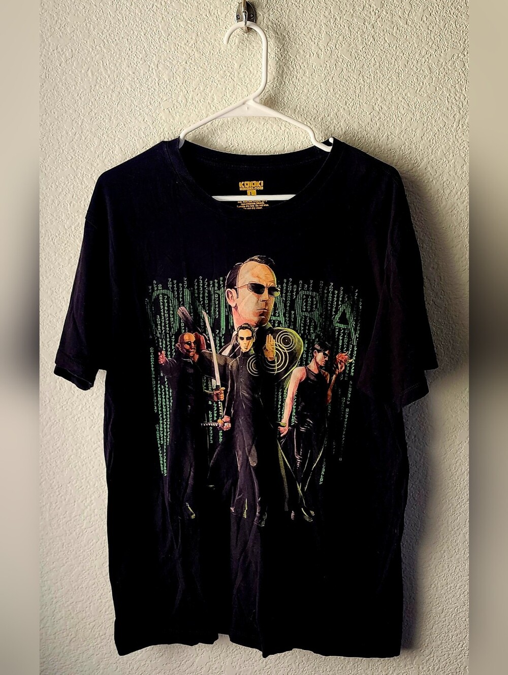Koioki Matrix Black Short-Sleeve Graphic Tee with Green and Yellow Print